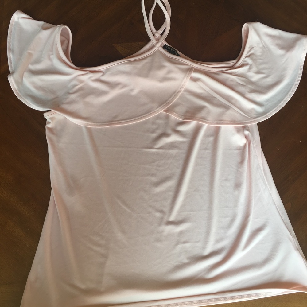 Off-the-shoulder flutter top.